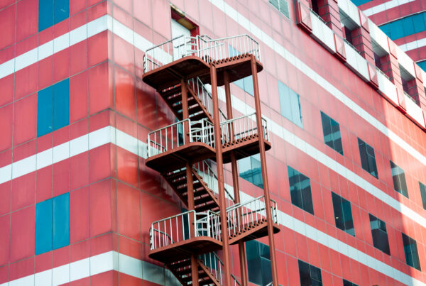 A staircase on the wall of an apartment used for emergency exits