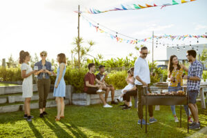 Multi-family housing residents having a private event on their building’s rooftop.